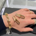 黄金手链，奢华与时尚的完美融合，揭秘十大热门款式背后的故事！